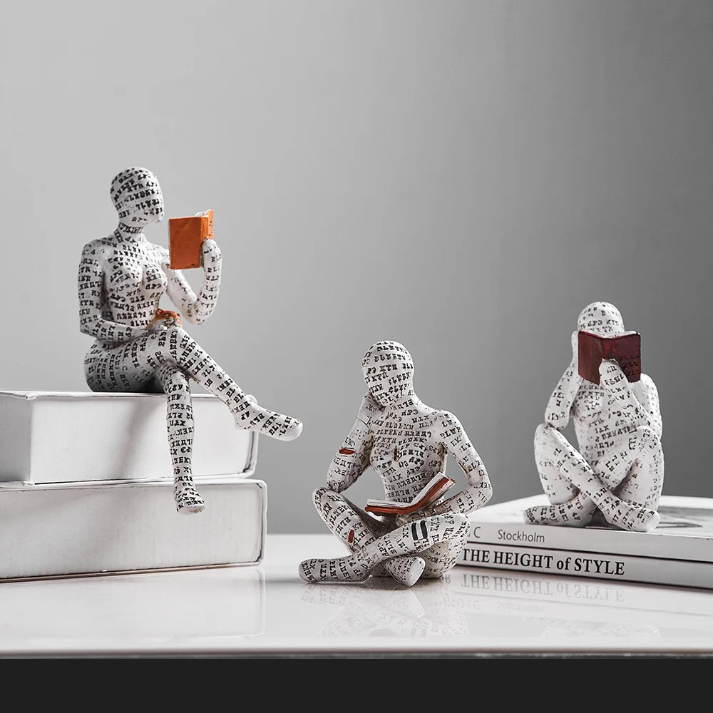 Modern women reading resin sculpture