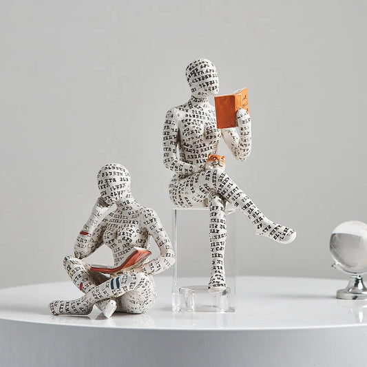 Modern women reading resin sculpture